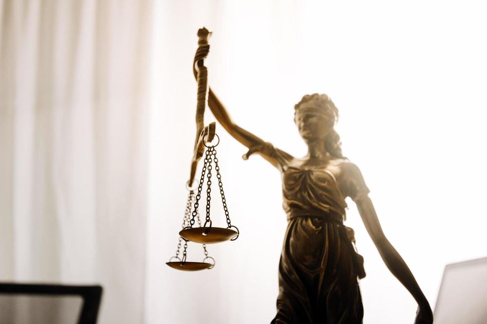 Scales of justice in the offices of Panio Law