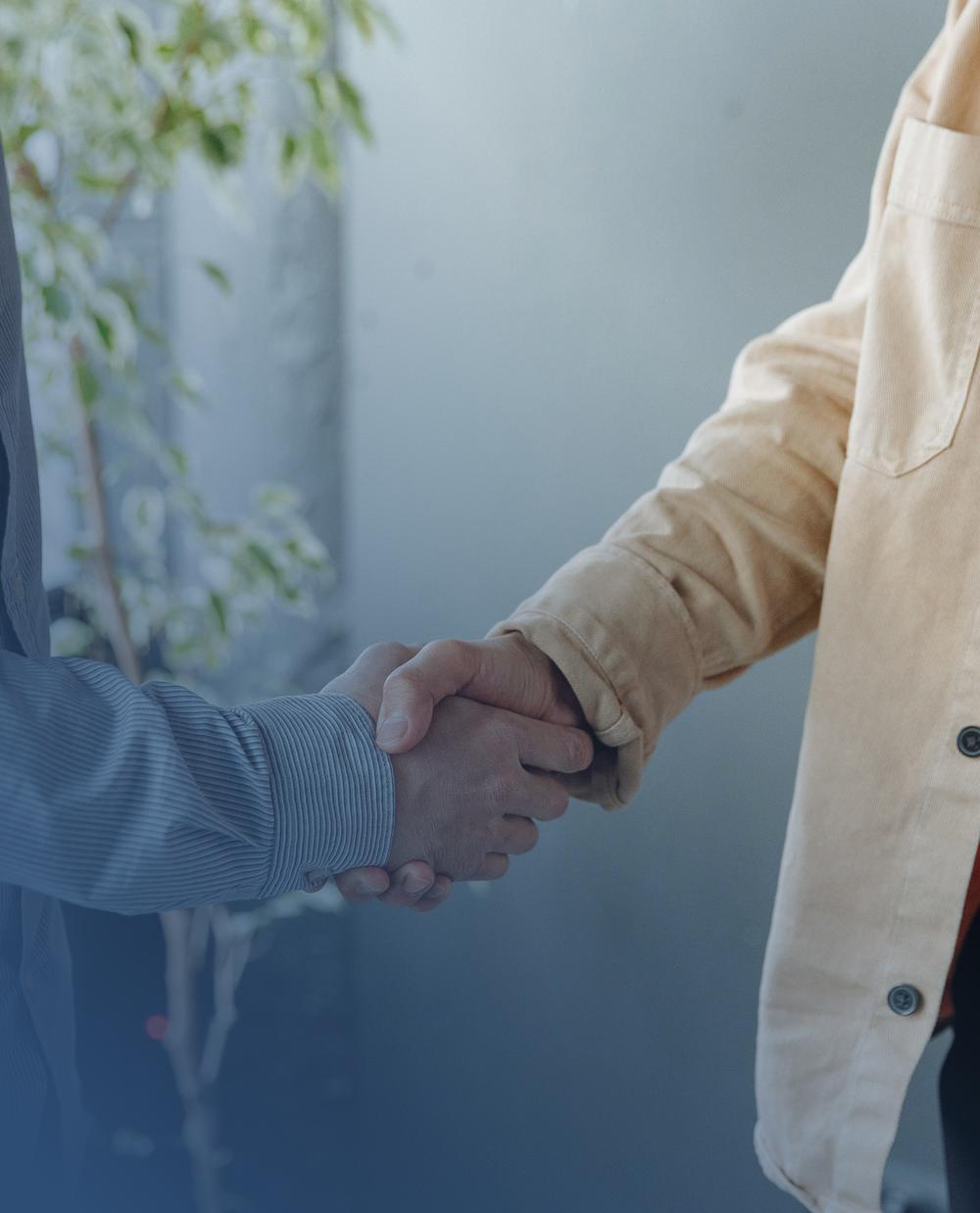 Attorney and client shaking hands